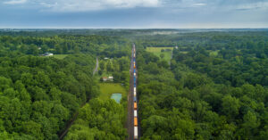 cargo containers in transit via rail transport