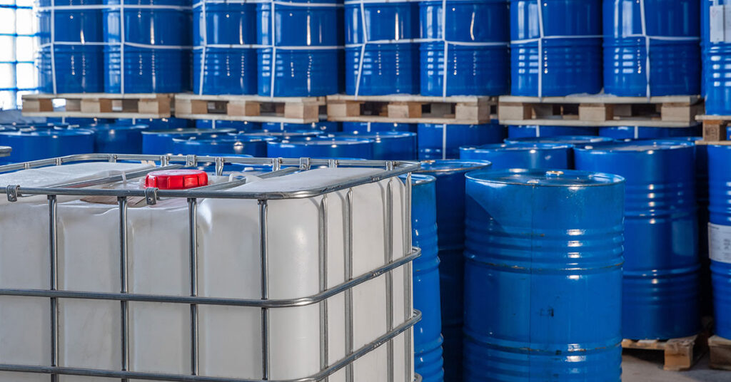 barrels of contained chemicals in a warehouse